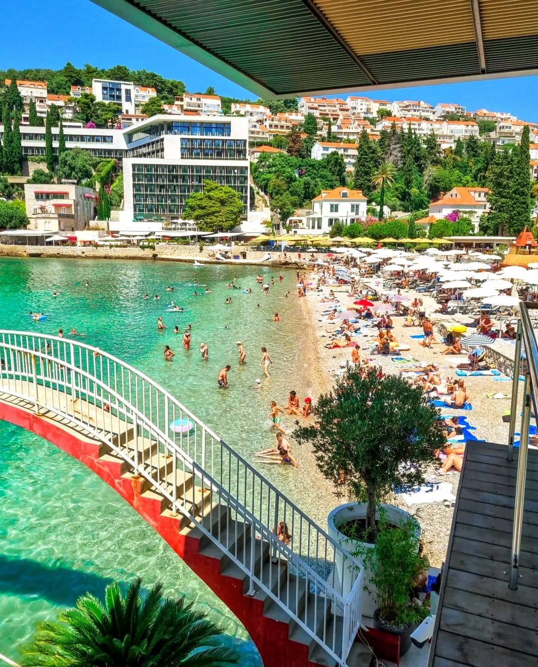 Relaxing by the water at Uvala Lapad Beach in Croatia